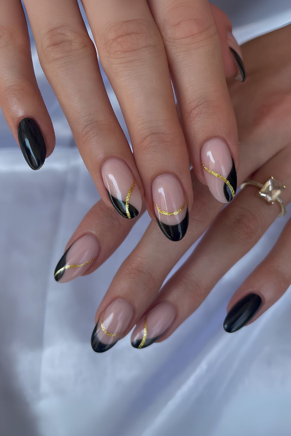 Black and gold French nails