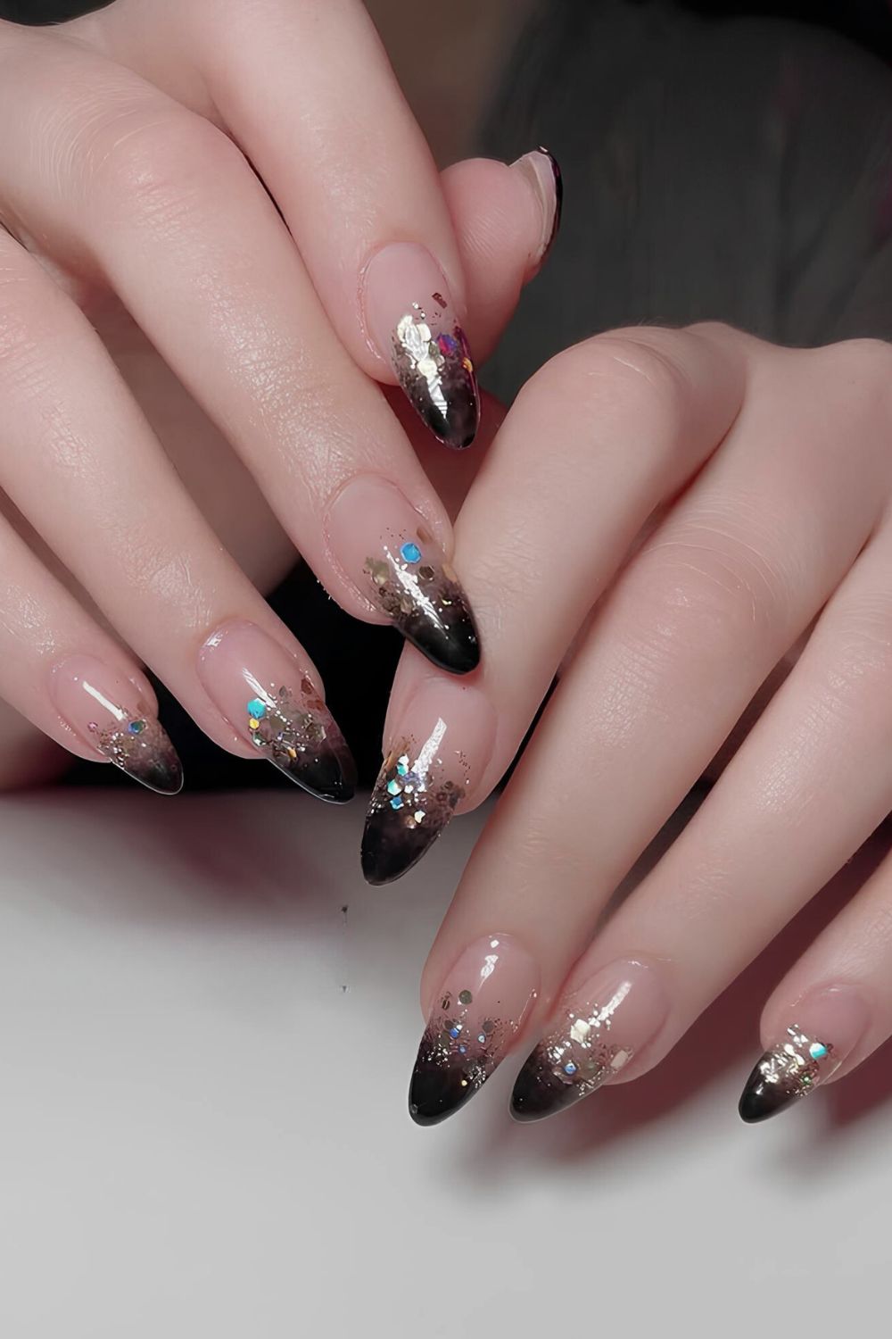 Black and gold glitter ombre nails