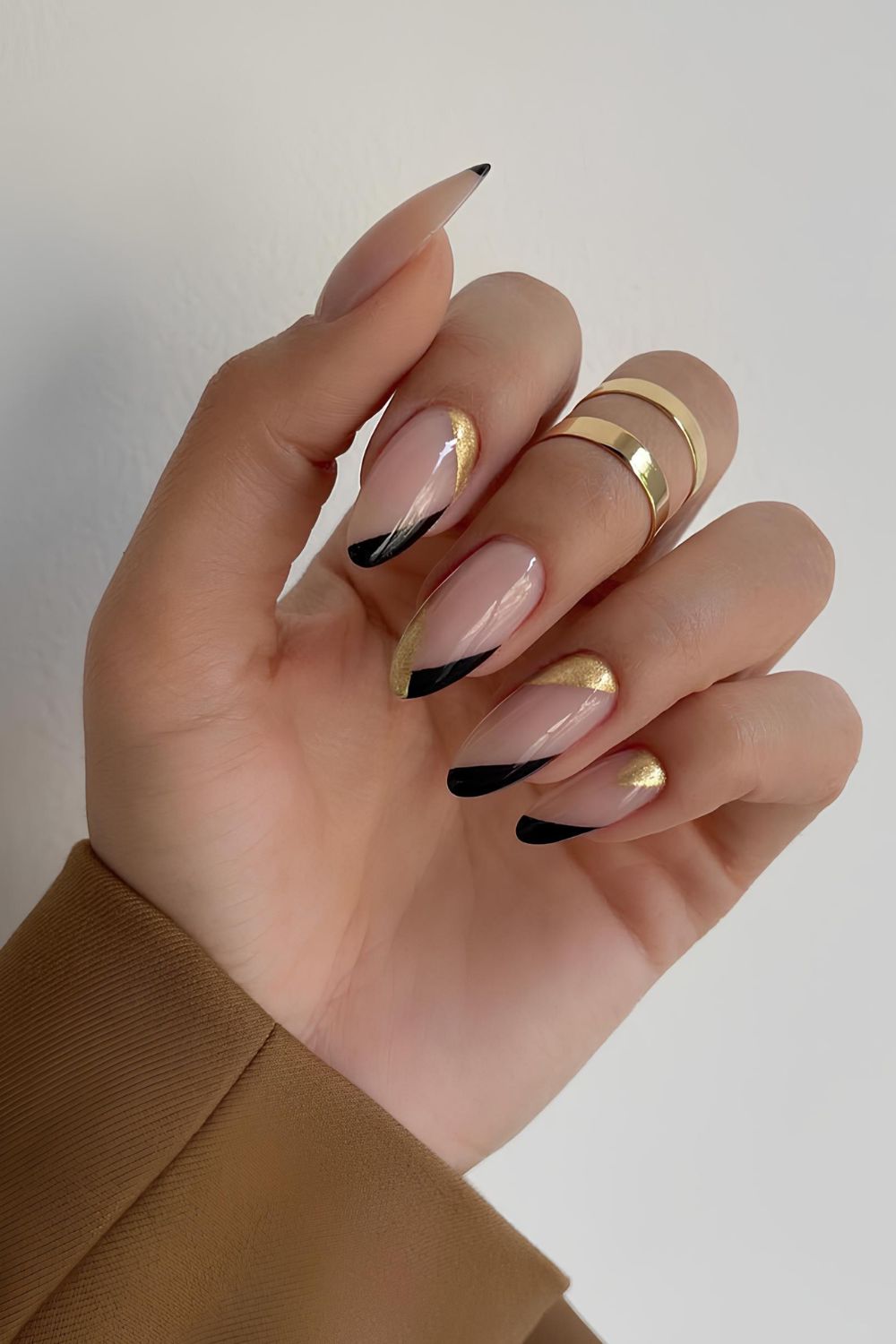 Black and gold side French tip nails