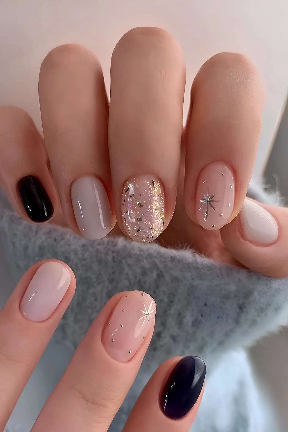 Black and gray celestial nail design