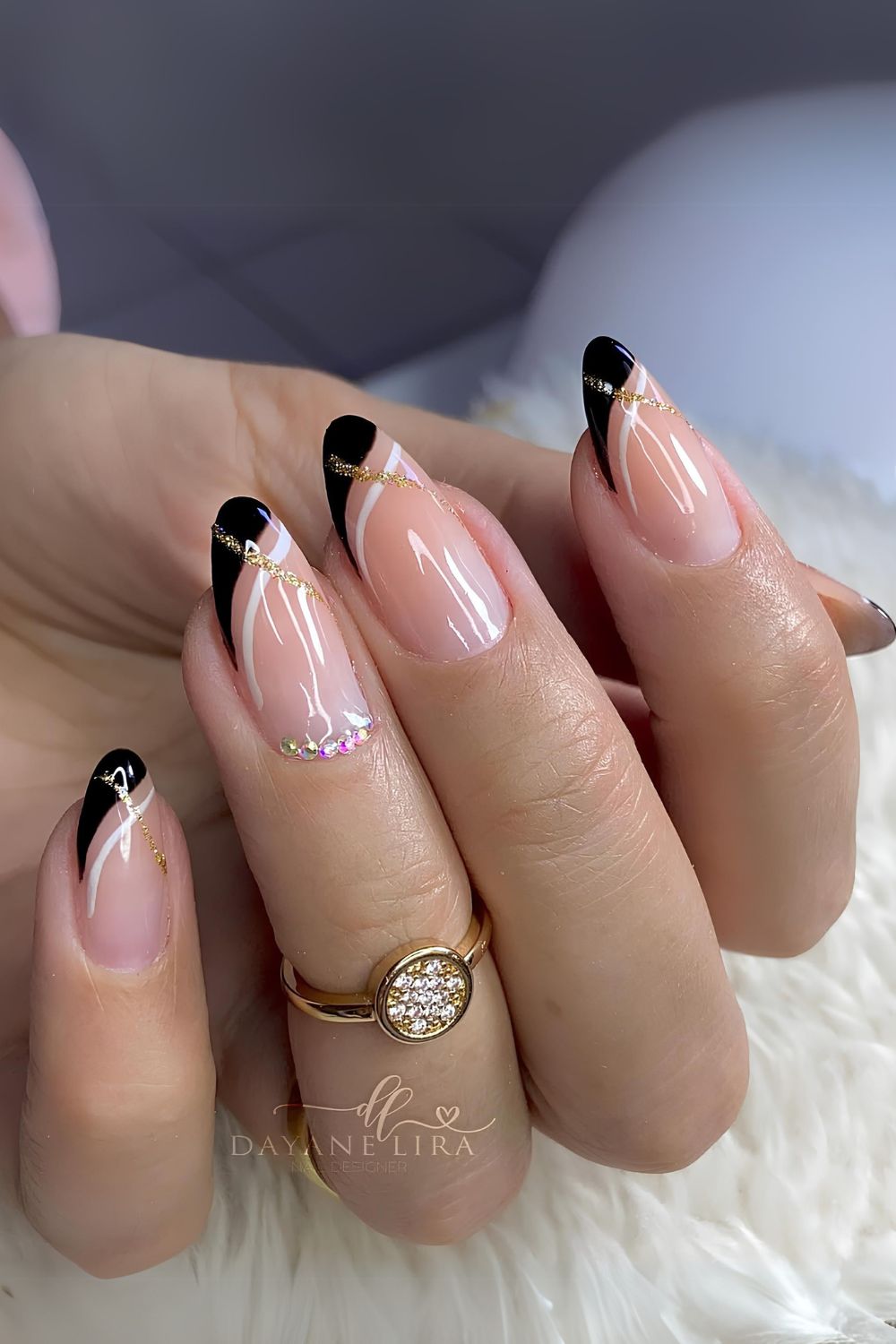 Black and white double French nails with gold swirls