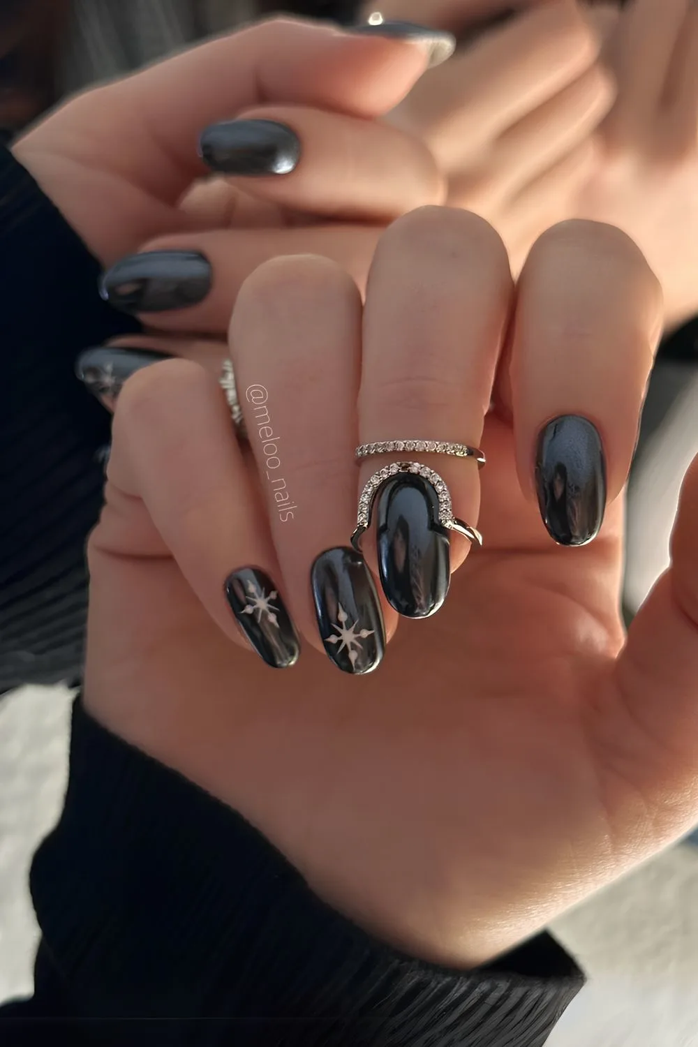 Black chrome nails with snowflakes