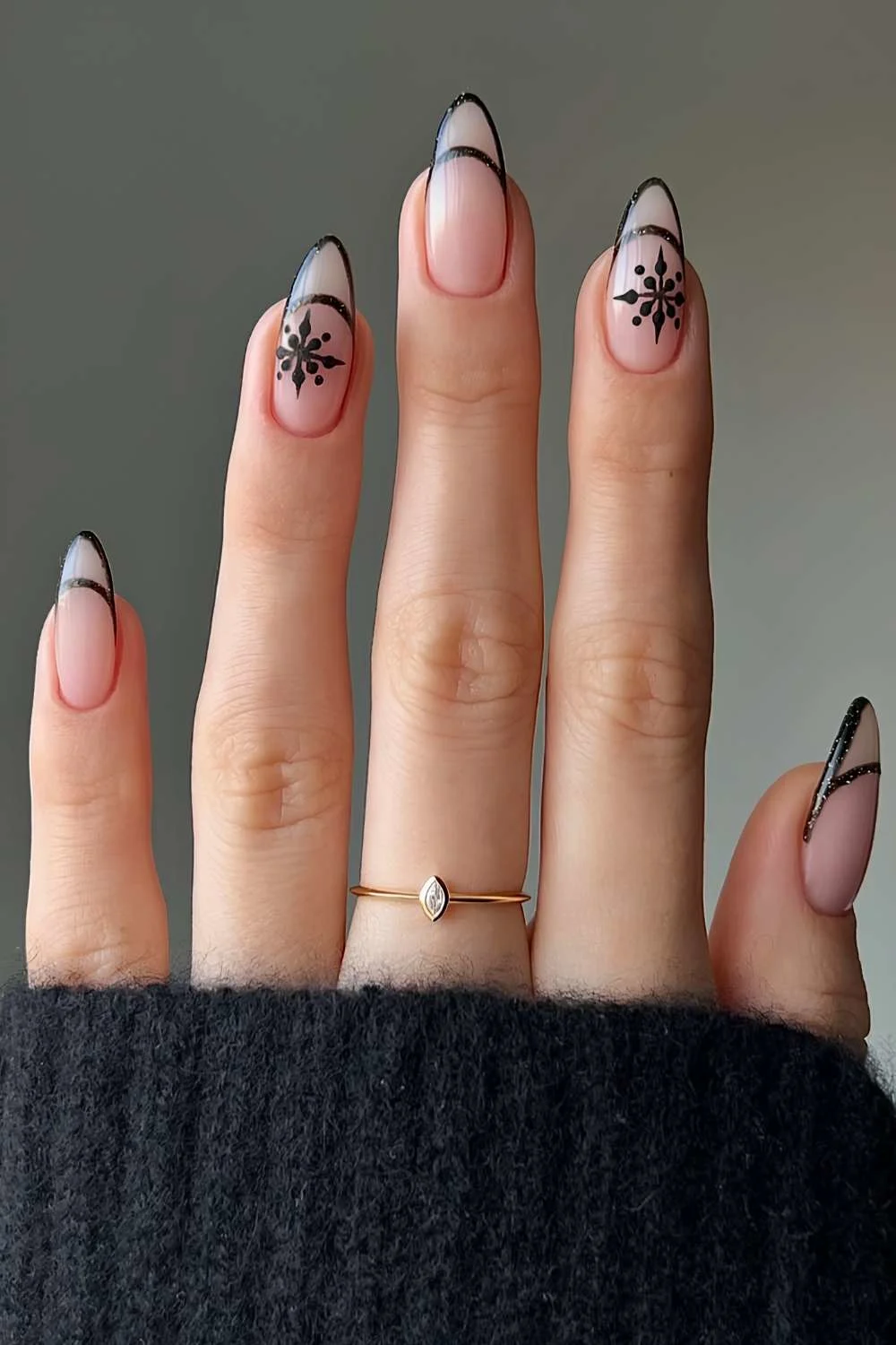 Black filigree French mani with snowflakes