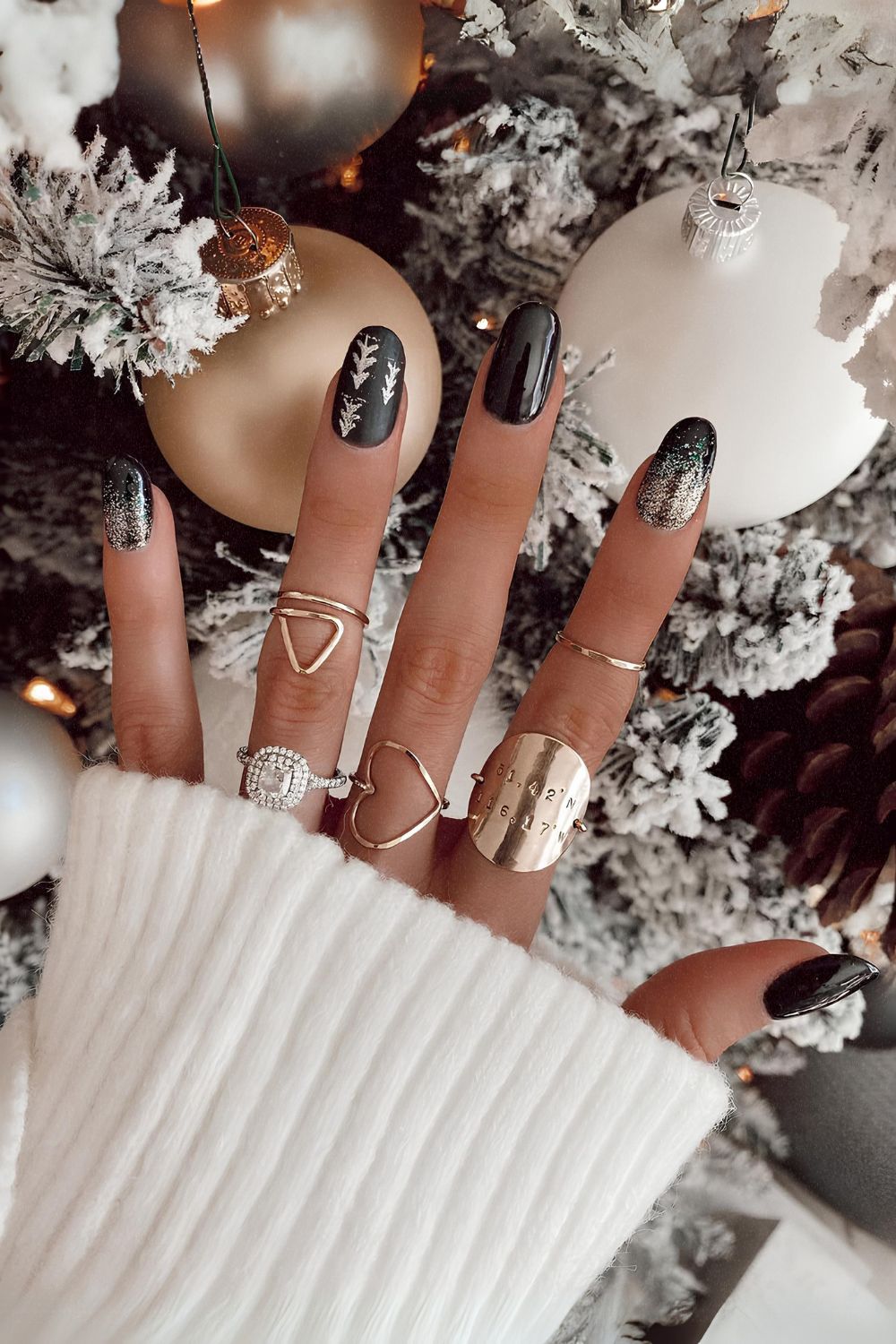 Black nails with Christmas tree accents