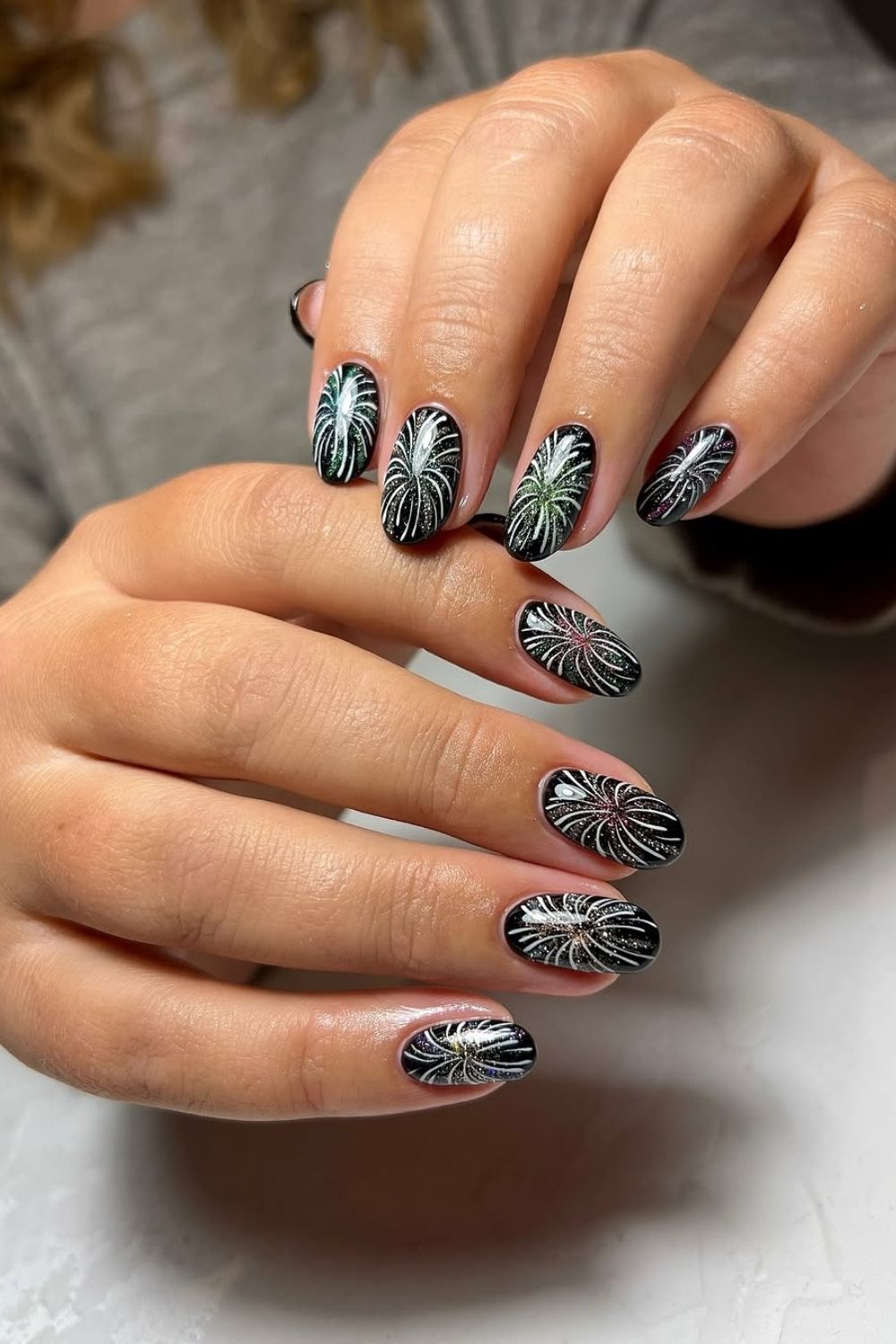 Black nails with firework accents