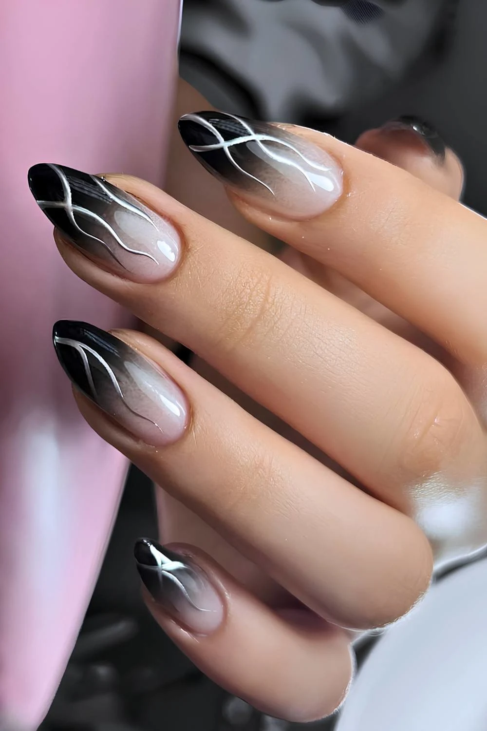 Black ombre nails with silver chrome lines