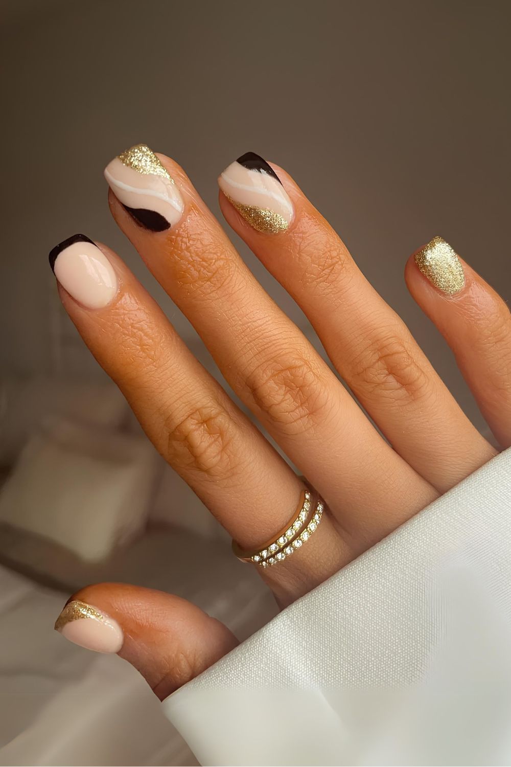 Black gold and white nails