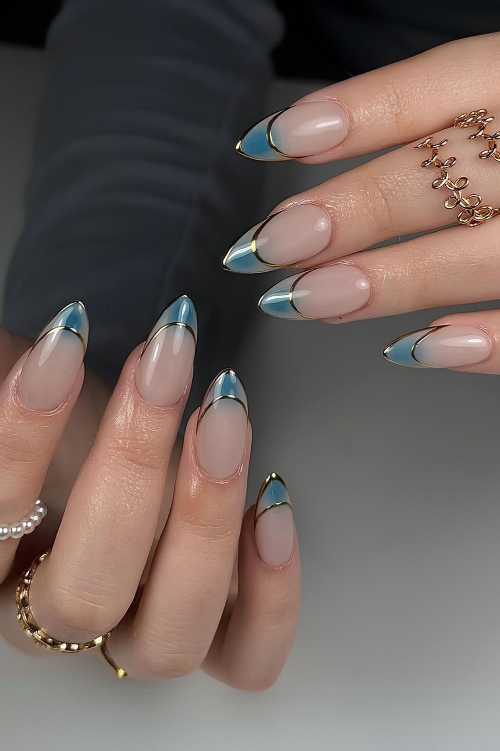 Blue French tip nails with chrome outline