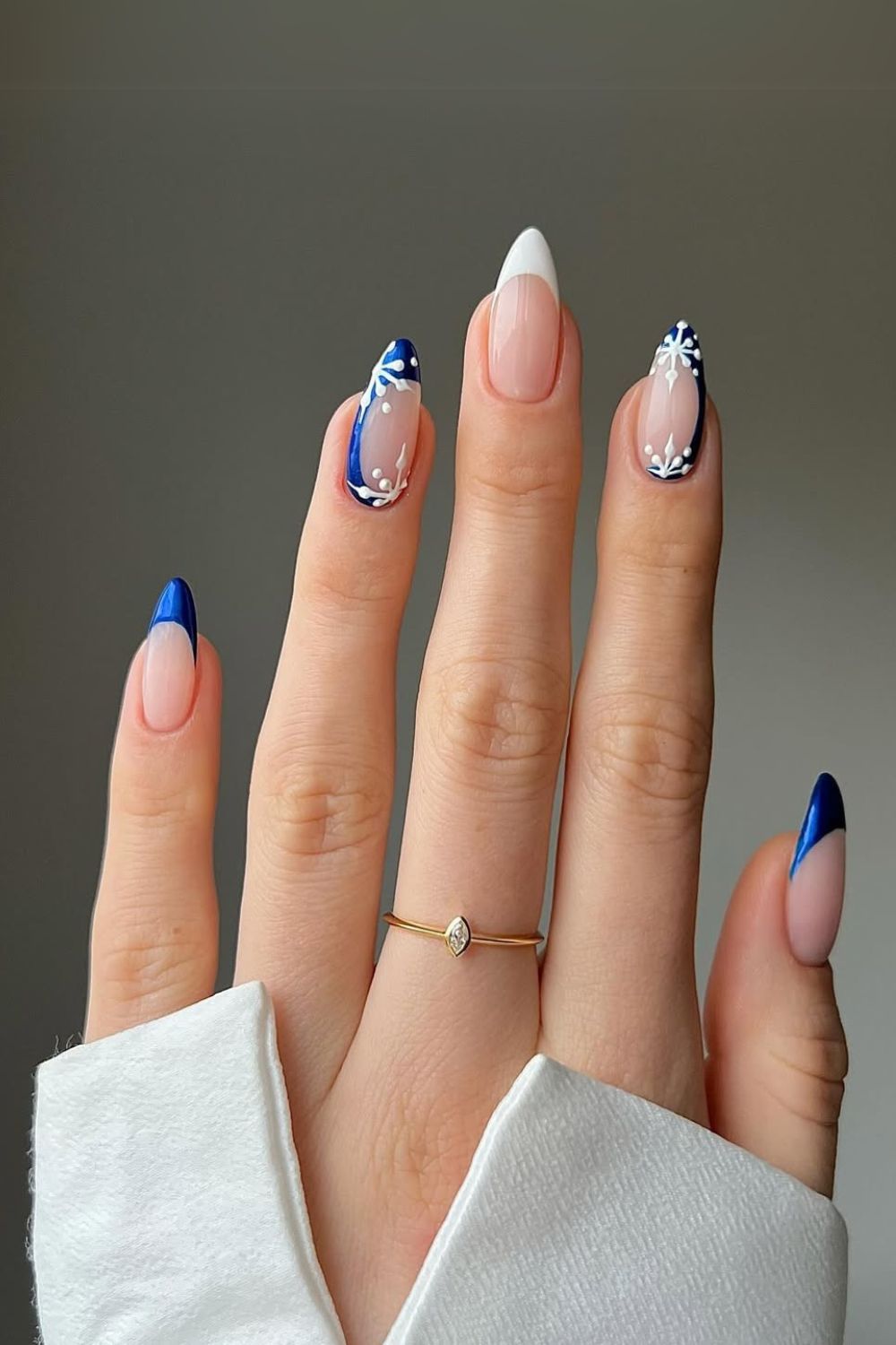 Blue and white nails with snowflakes