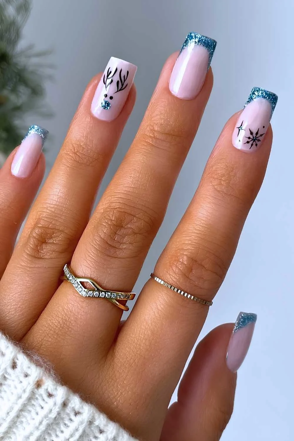 Blue glitter French nails with reindeer art