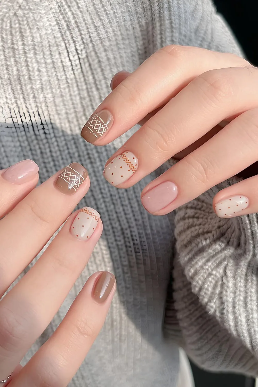 Brown and beige nails with sweater art