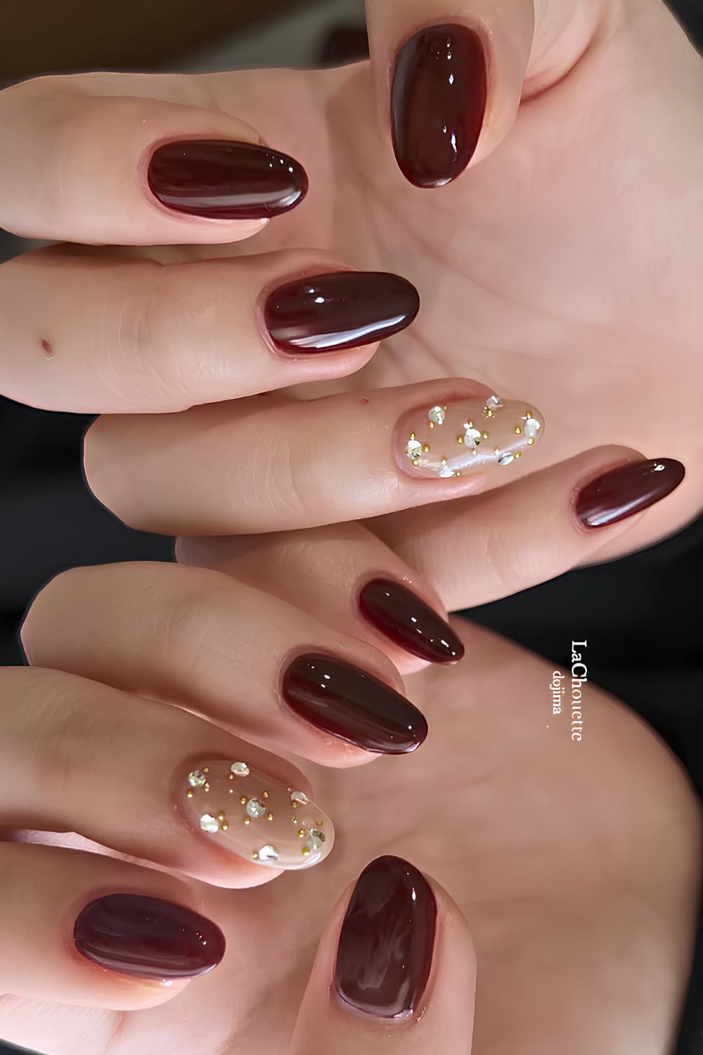 Brown mani with accent gems
