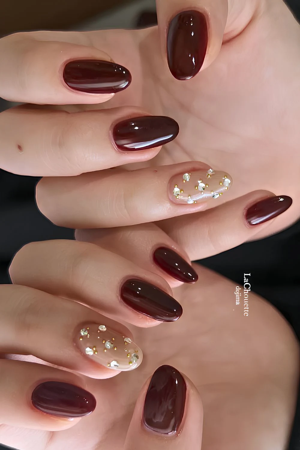Brown mani with accent gems