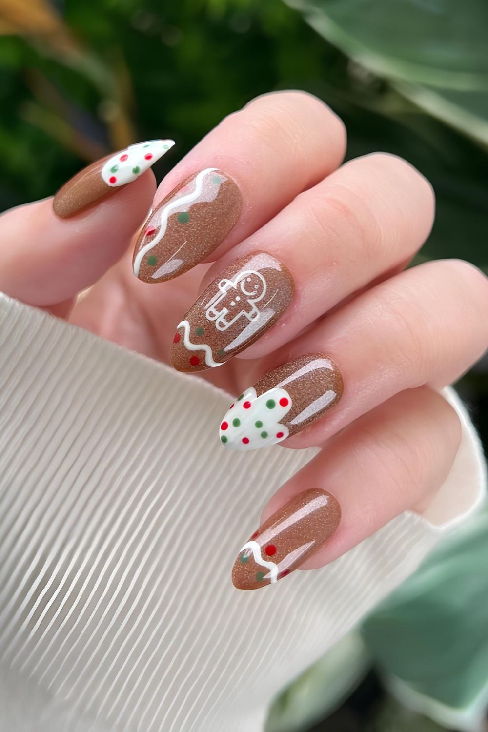 Brown shimmery nails with gingerbread and colorful dot accents