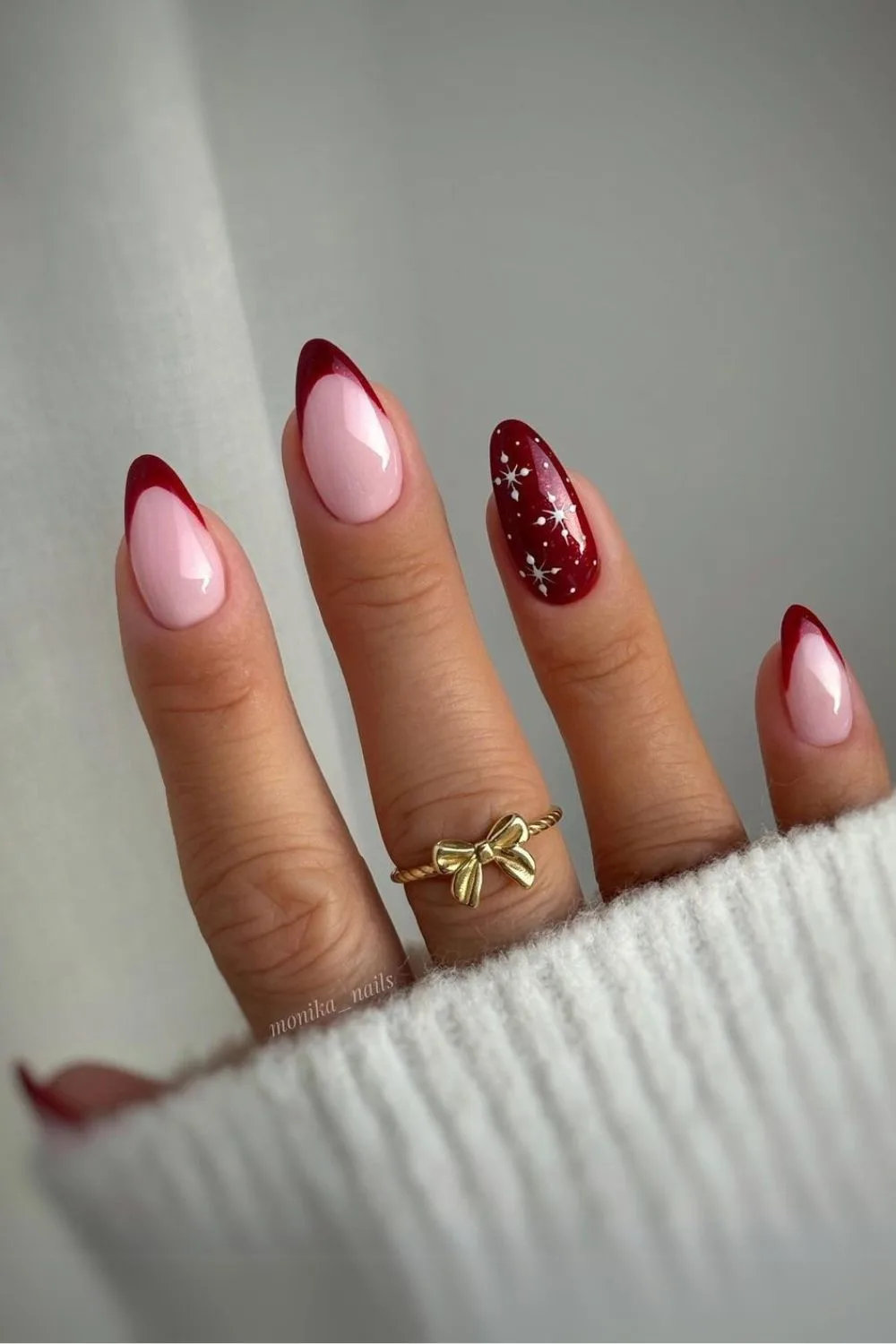 Burgundy French tip nails with snowflakes