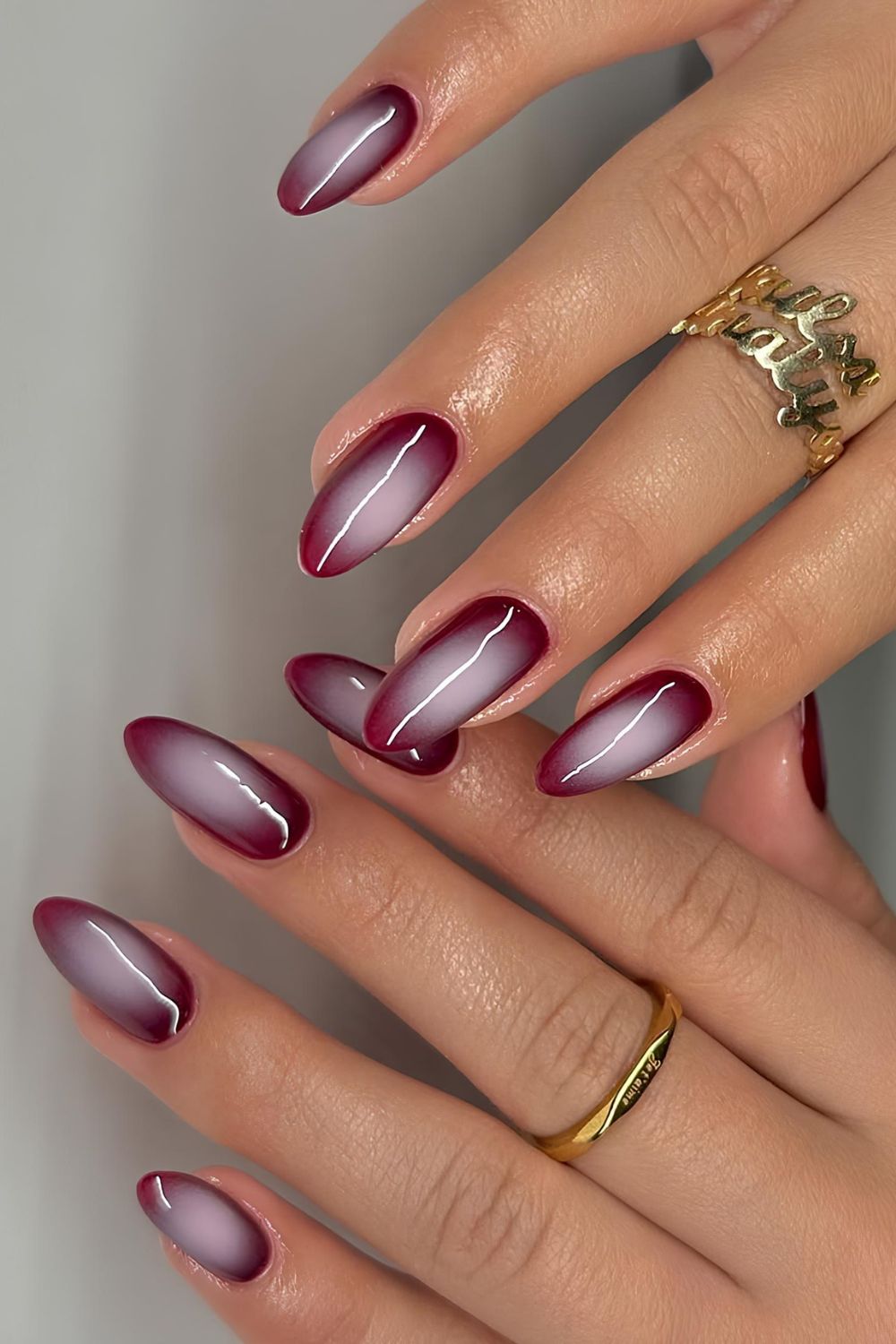 Burgundy and white aura effect nails