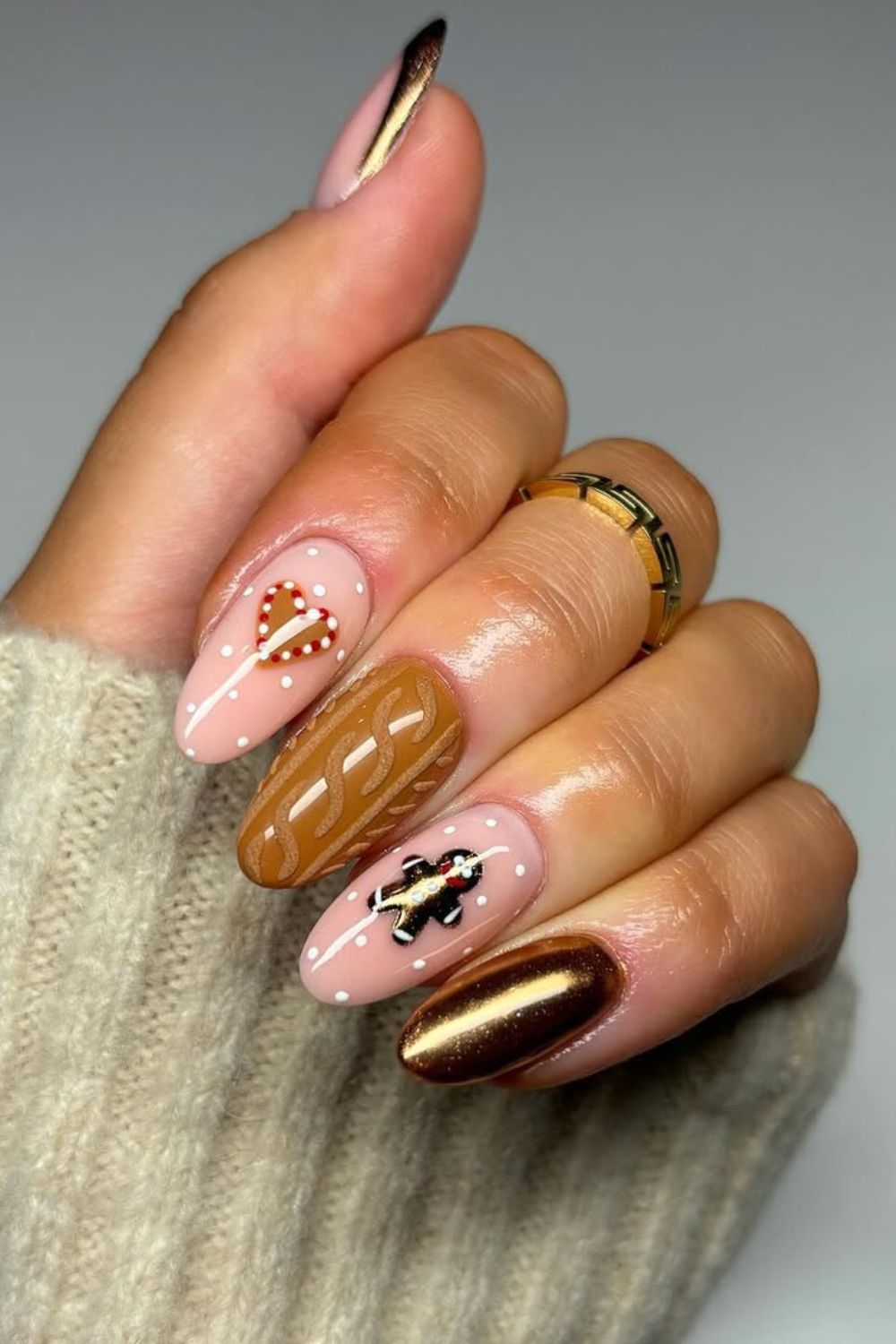 Caramel and gold chrome nails with gingerbread and heart accent