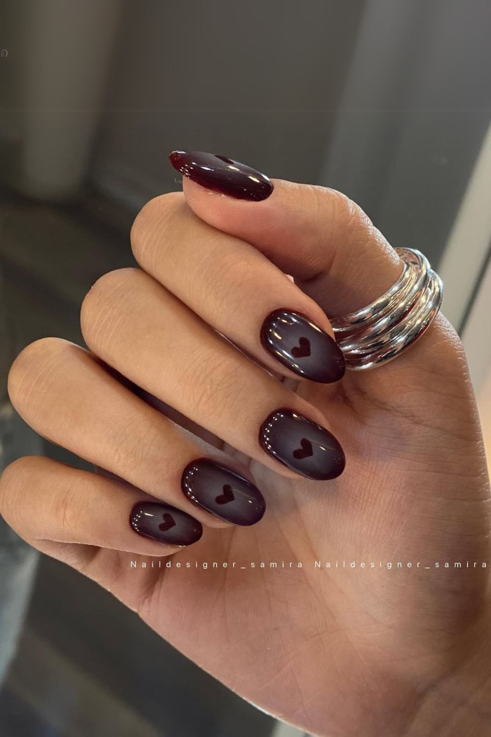 Cherry mocha nails with heart accent