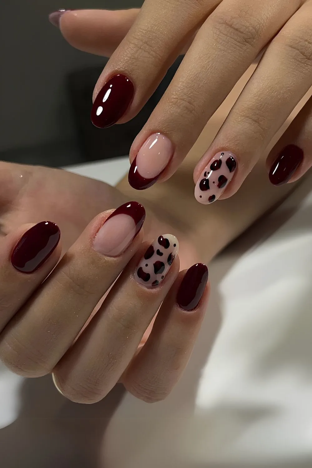 Cherry mocha nails with leopard print accents