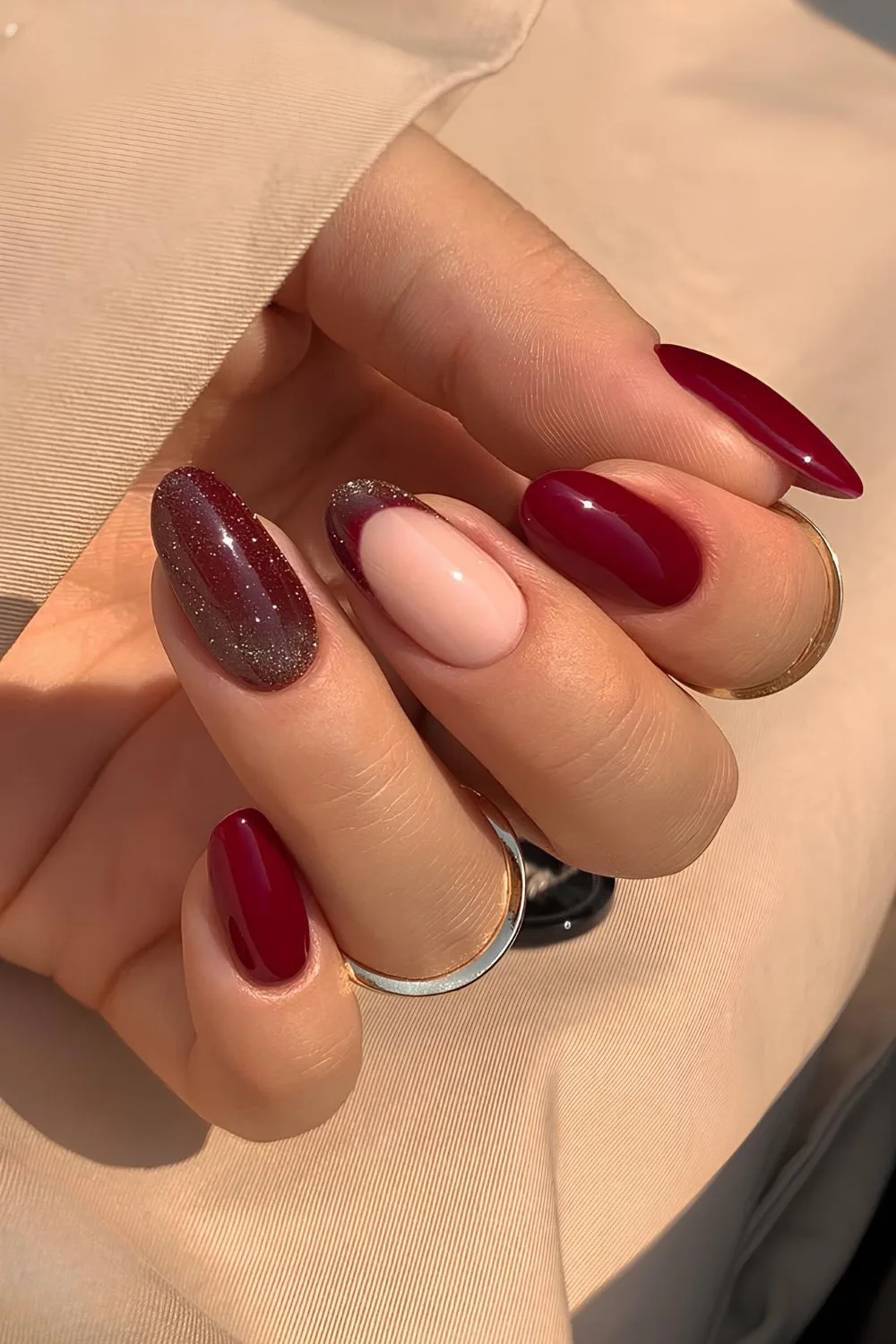 Cherry red nails with subtle glitter