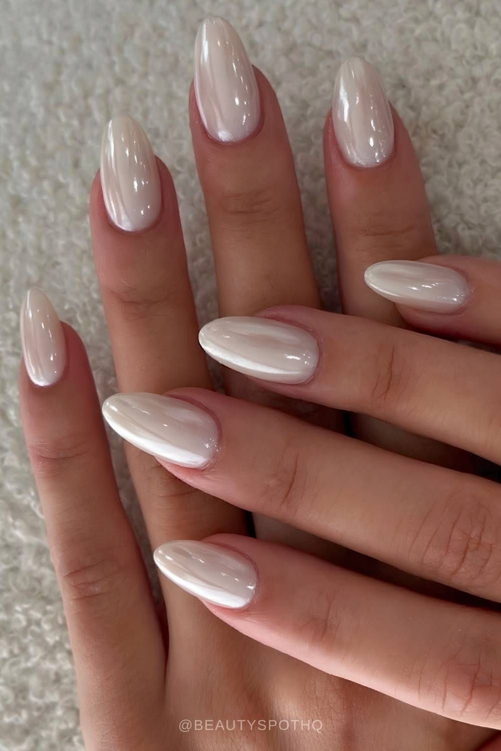 Chromed almond white manicure