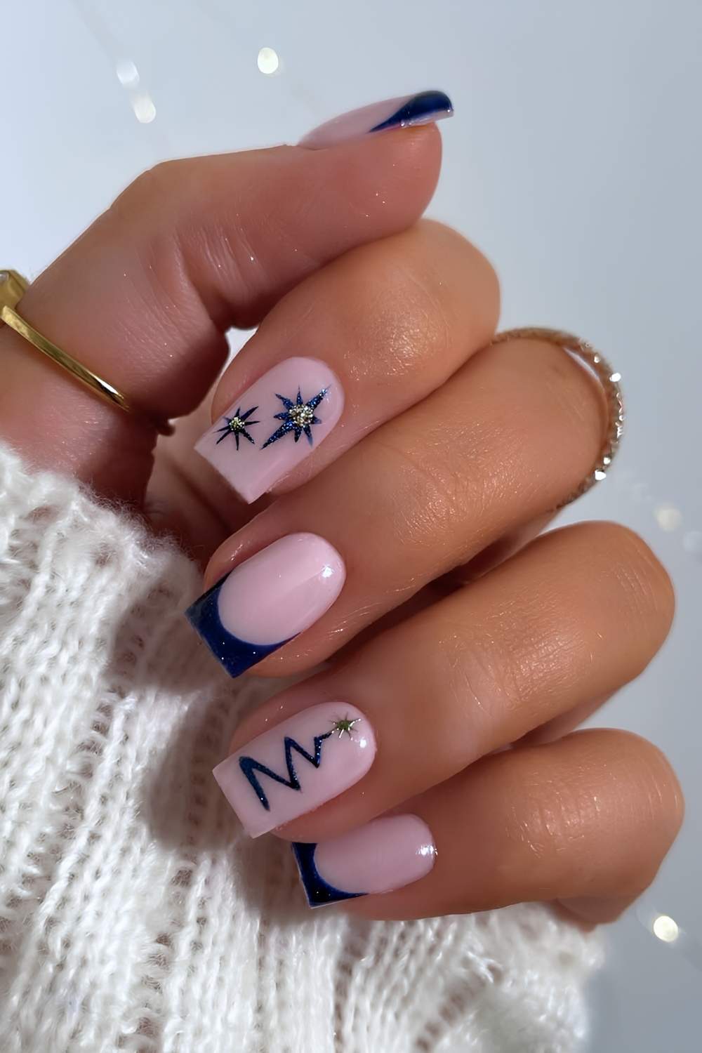 Dark blue French tips with Christmas motfis