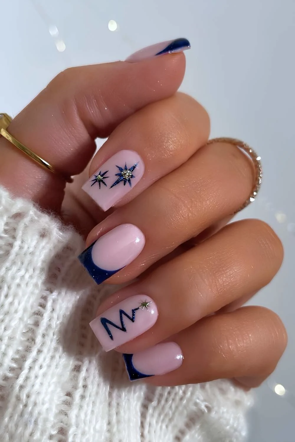 Dark blue French tips with Christmas motfis