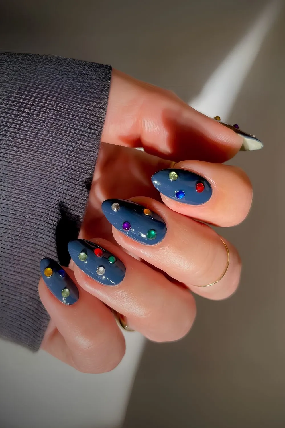 Dark blue mani with colorful rhinestones