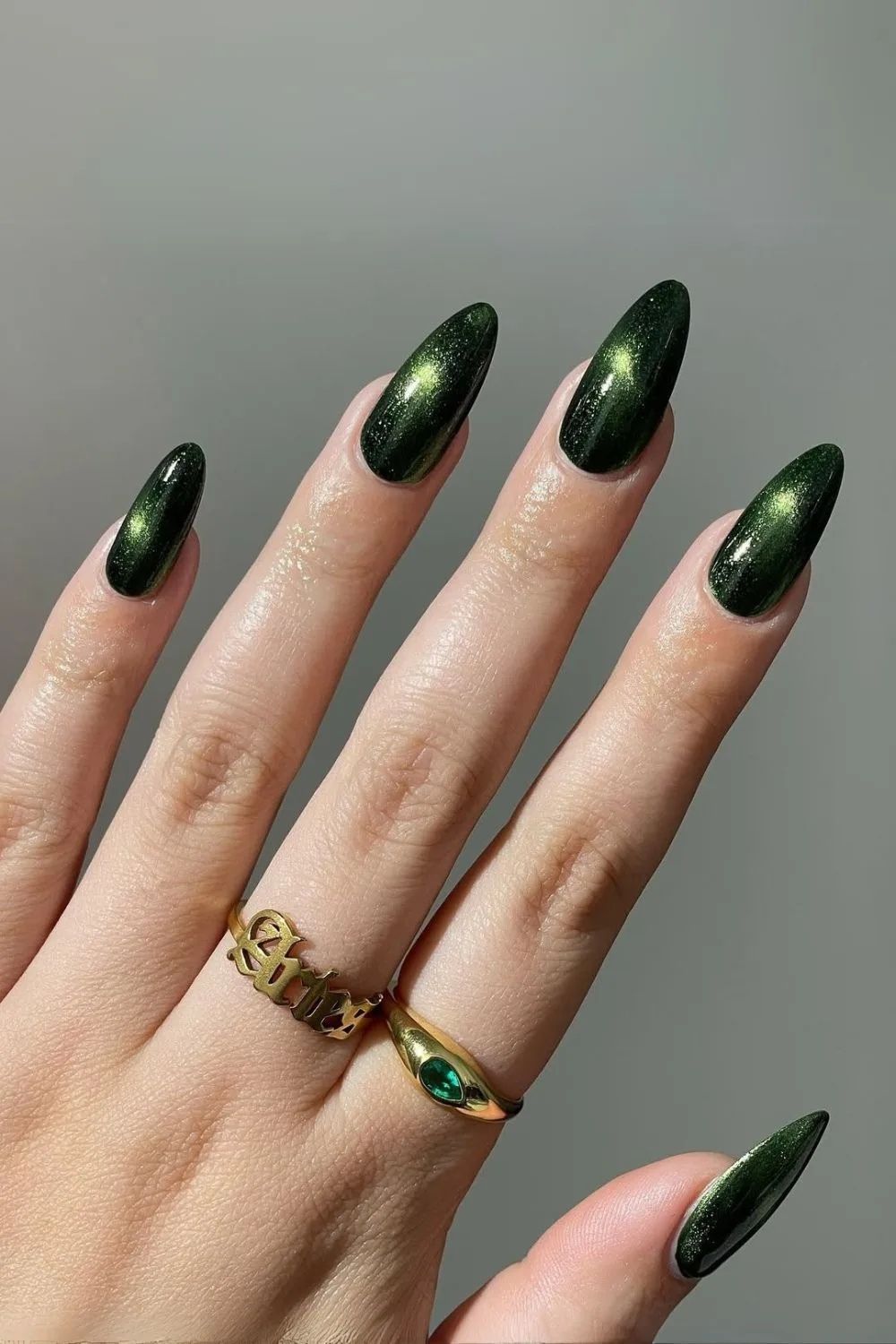 Dark green Wicked-inspired nails