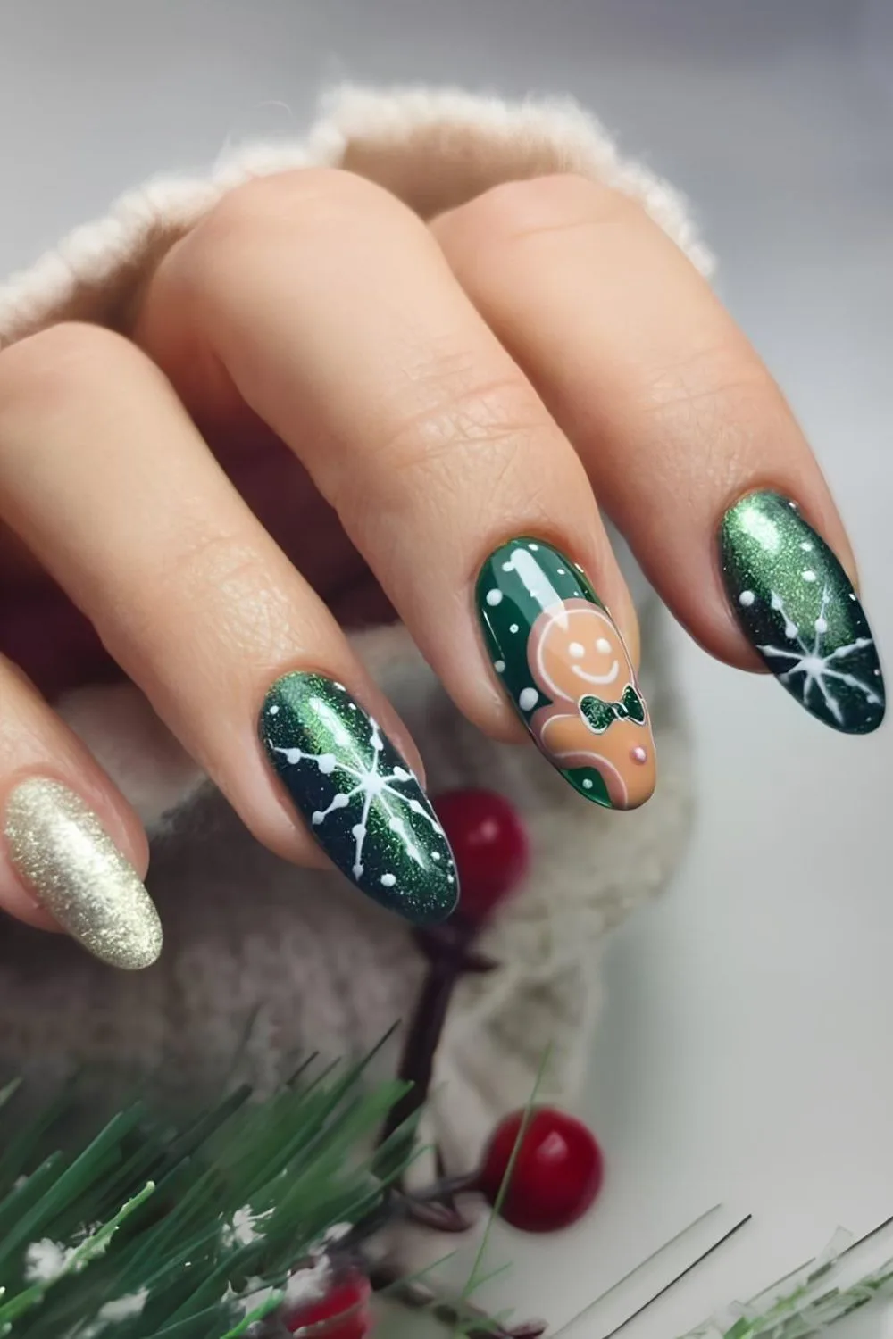 Dark green glitter nails with gingerbread man and snowflake accent