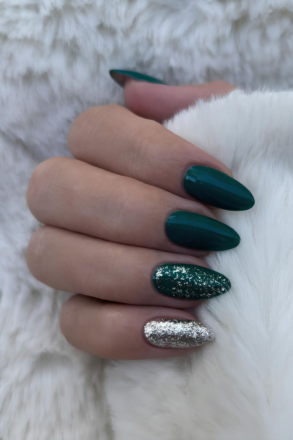 Dark green nails with silver glitter