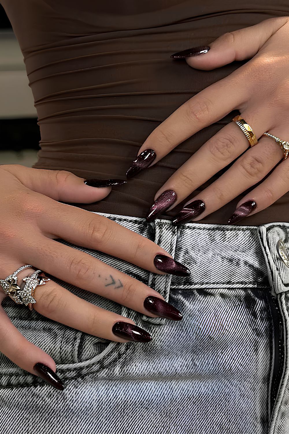 Dark purple cat-eye nails