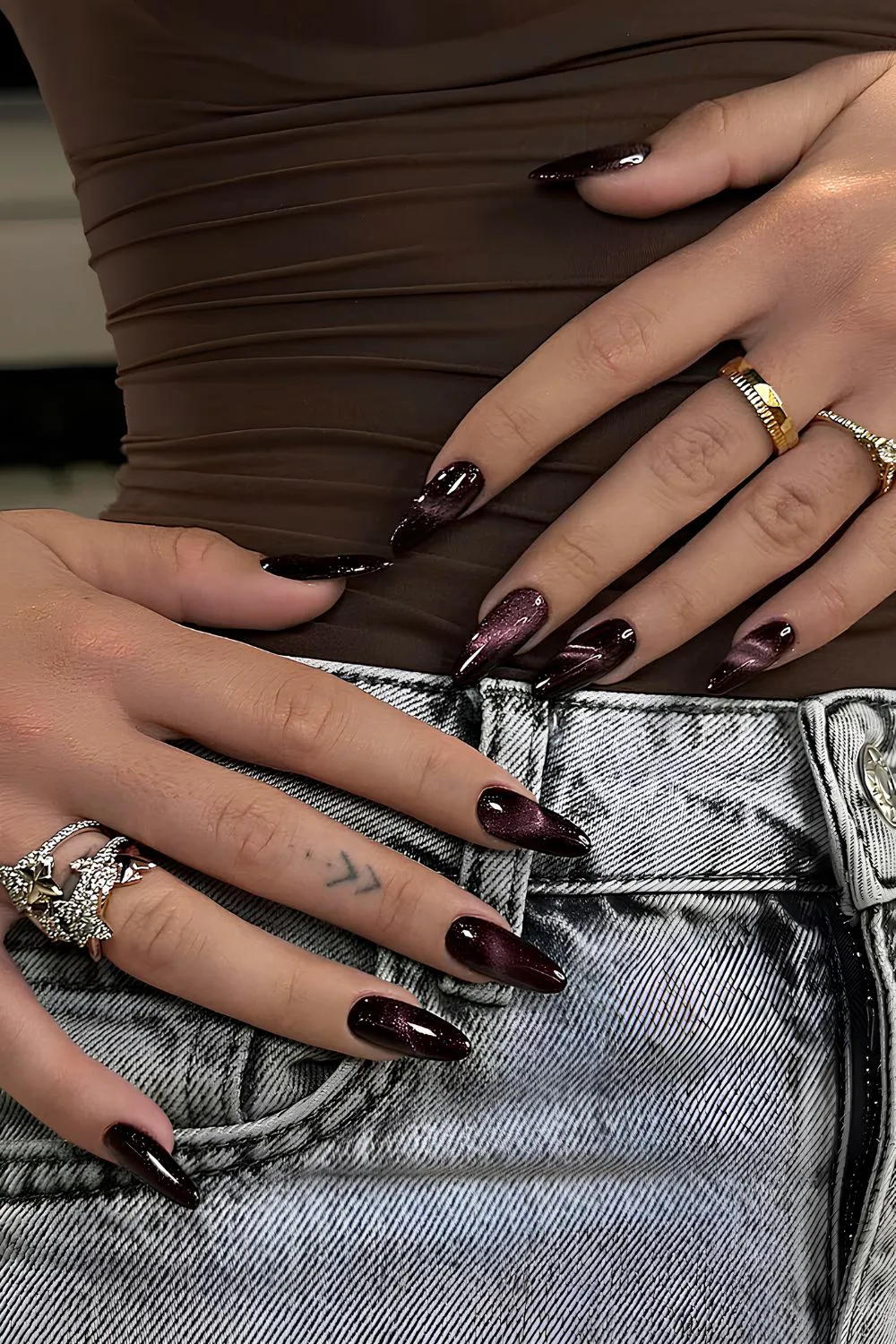 Dark purple cat-eye nails