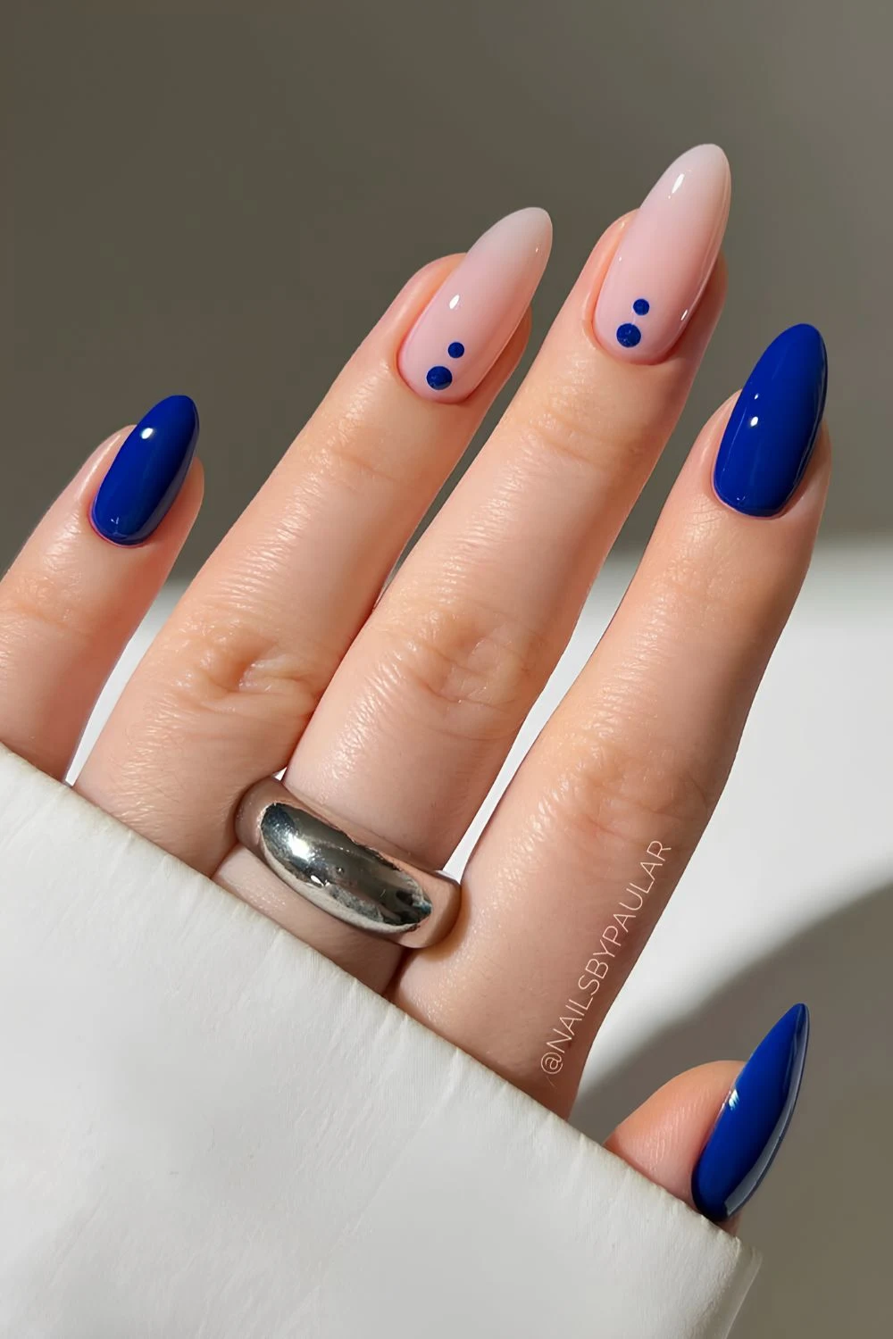 Deep blue nails with dot art