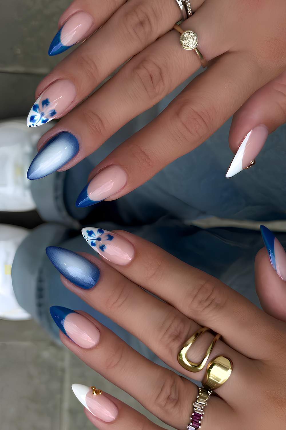 Deep blue nails with floral and aura accents