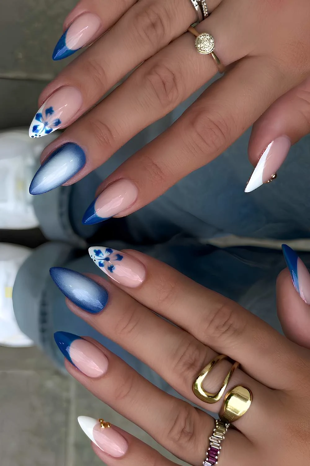 Deep blue nails with floral and aura accents