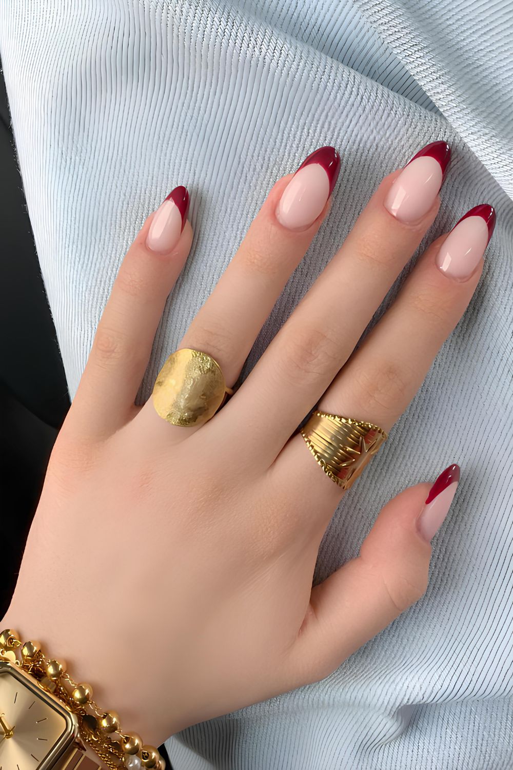 Deep red French tip mani