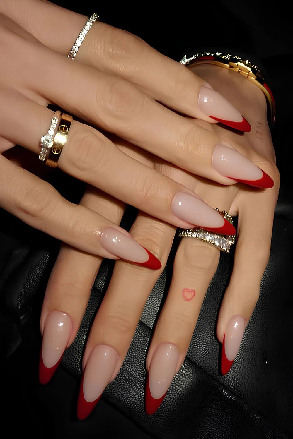 Elegant almond red French manicure