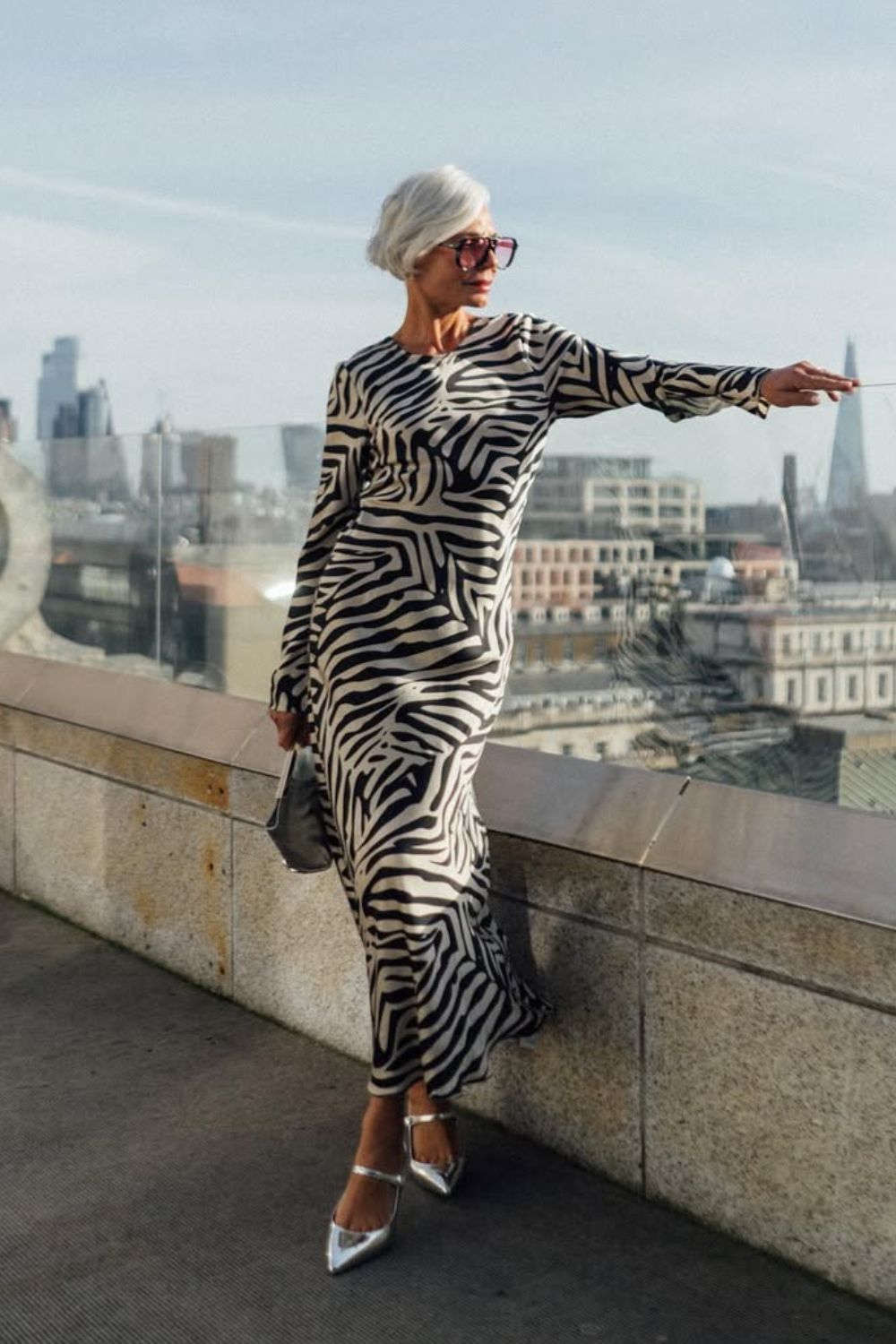 Famous influencer wearing zebra print dress