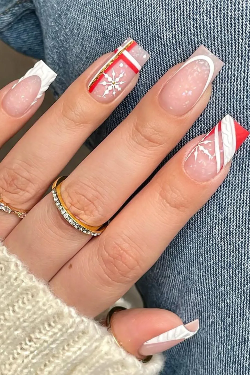 French tip nails with milky base and red and white stripes with matte finish