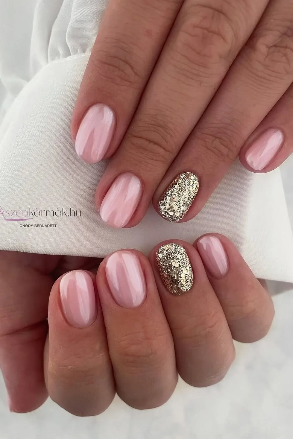 Glazed soft pink nails with glitters