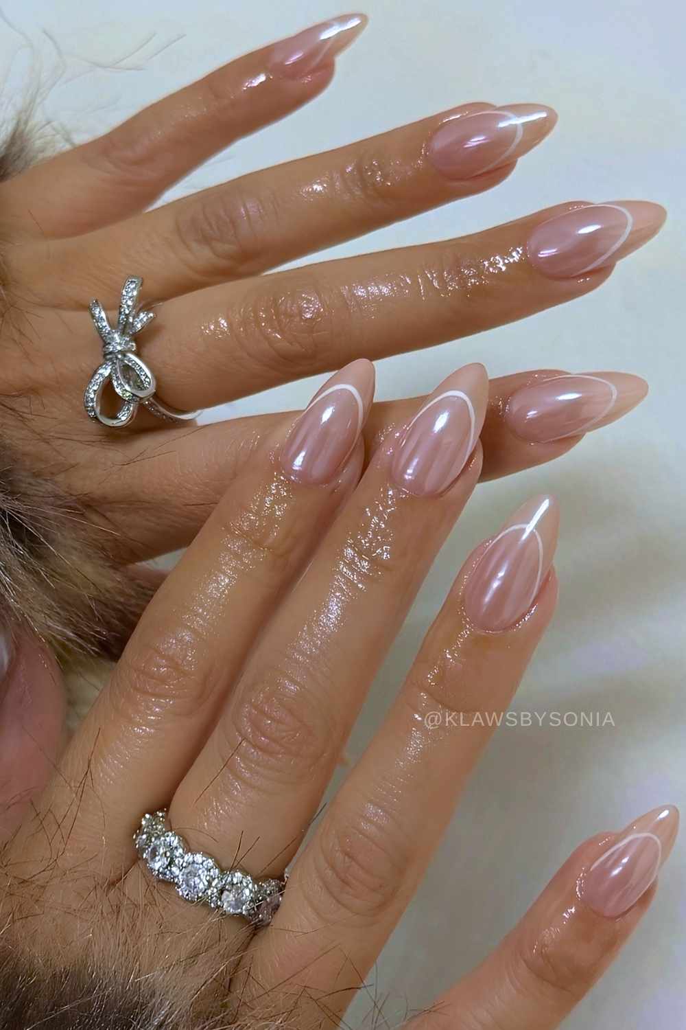 Glazed white French outline manicure