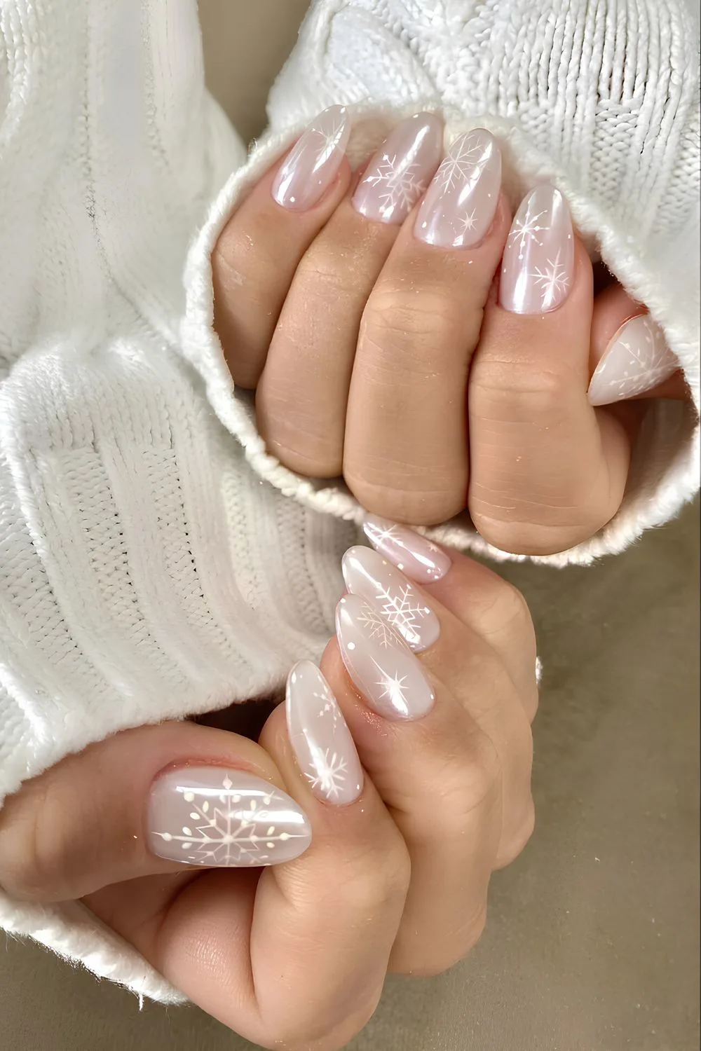 Glazed white nails with snowflakes