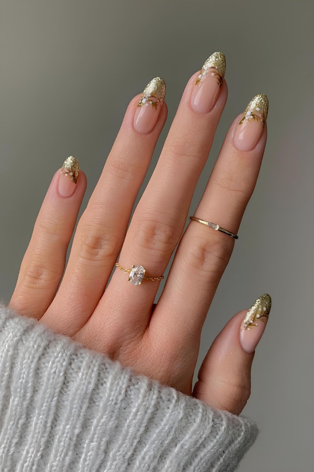 Glittery gold French tips edged with gold mistletoe design