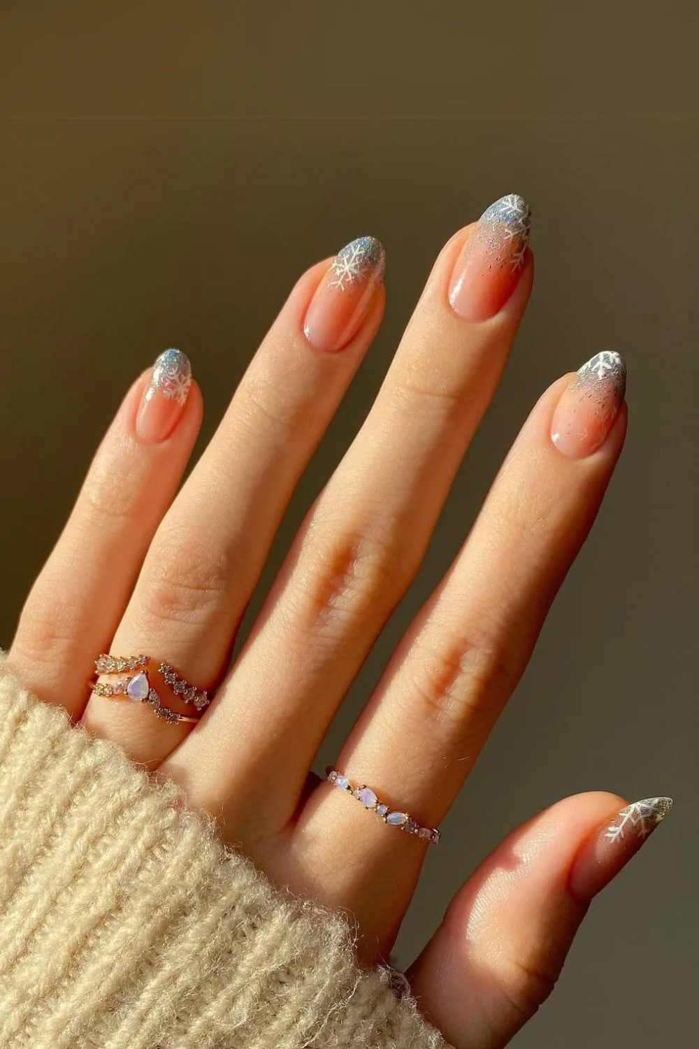 Glittery ombre French nails with snowflakes