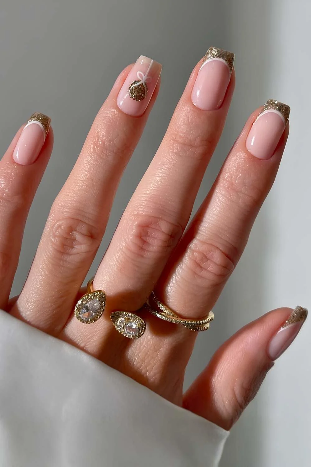 Gold Christmas French mani with bauble art