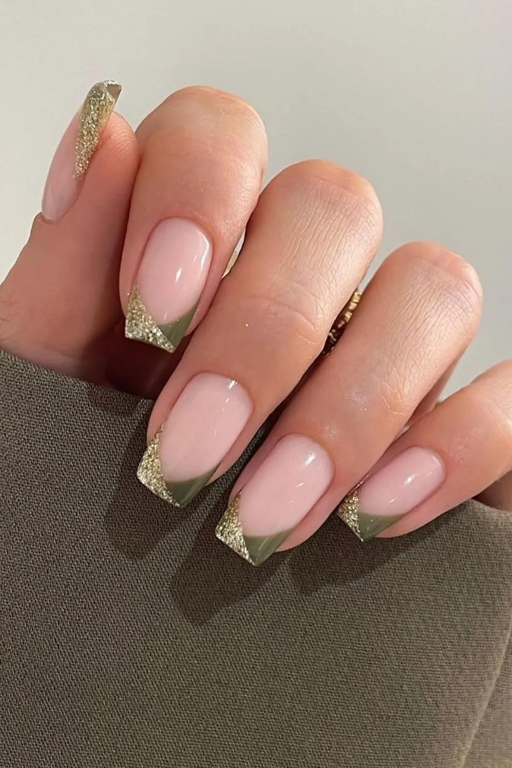 Gold and olive French tip nails