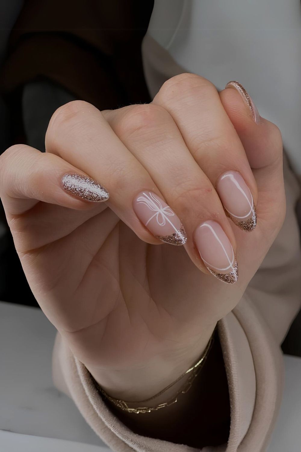 Gold and white Christmas French nails