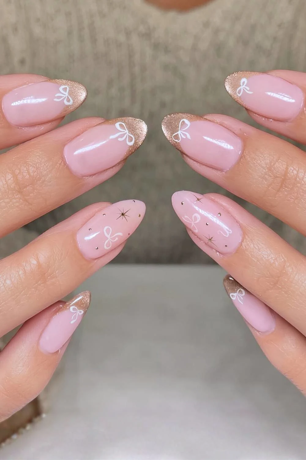 Gold cat eye French mani with bows