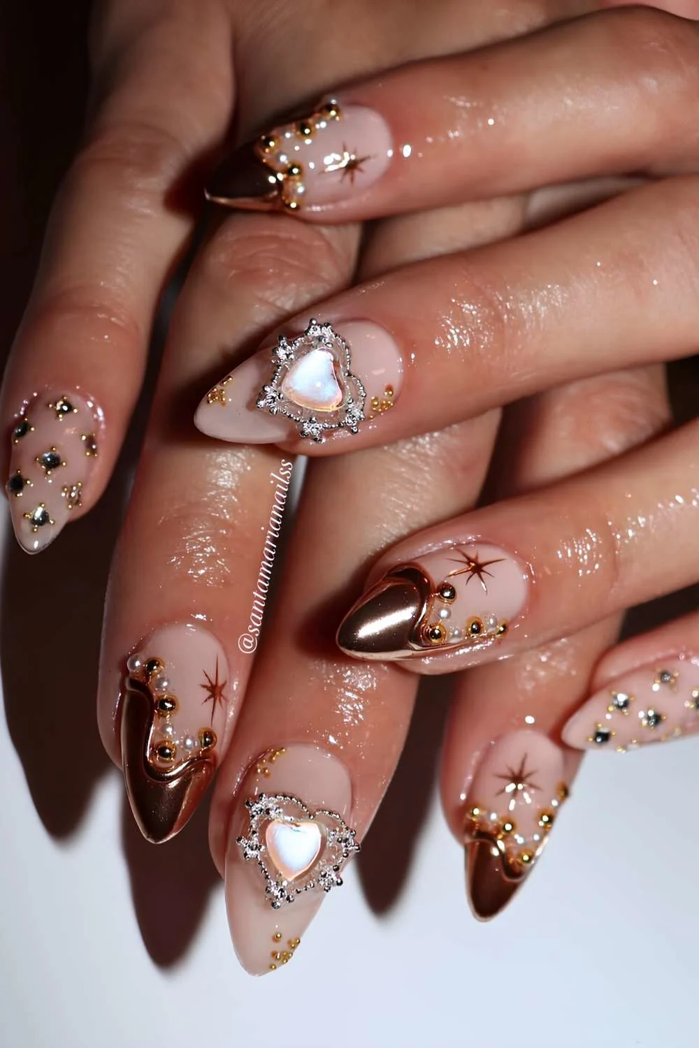 Gold chrome French mani with rhinestones